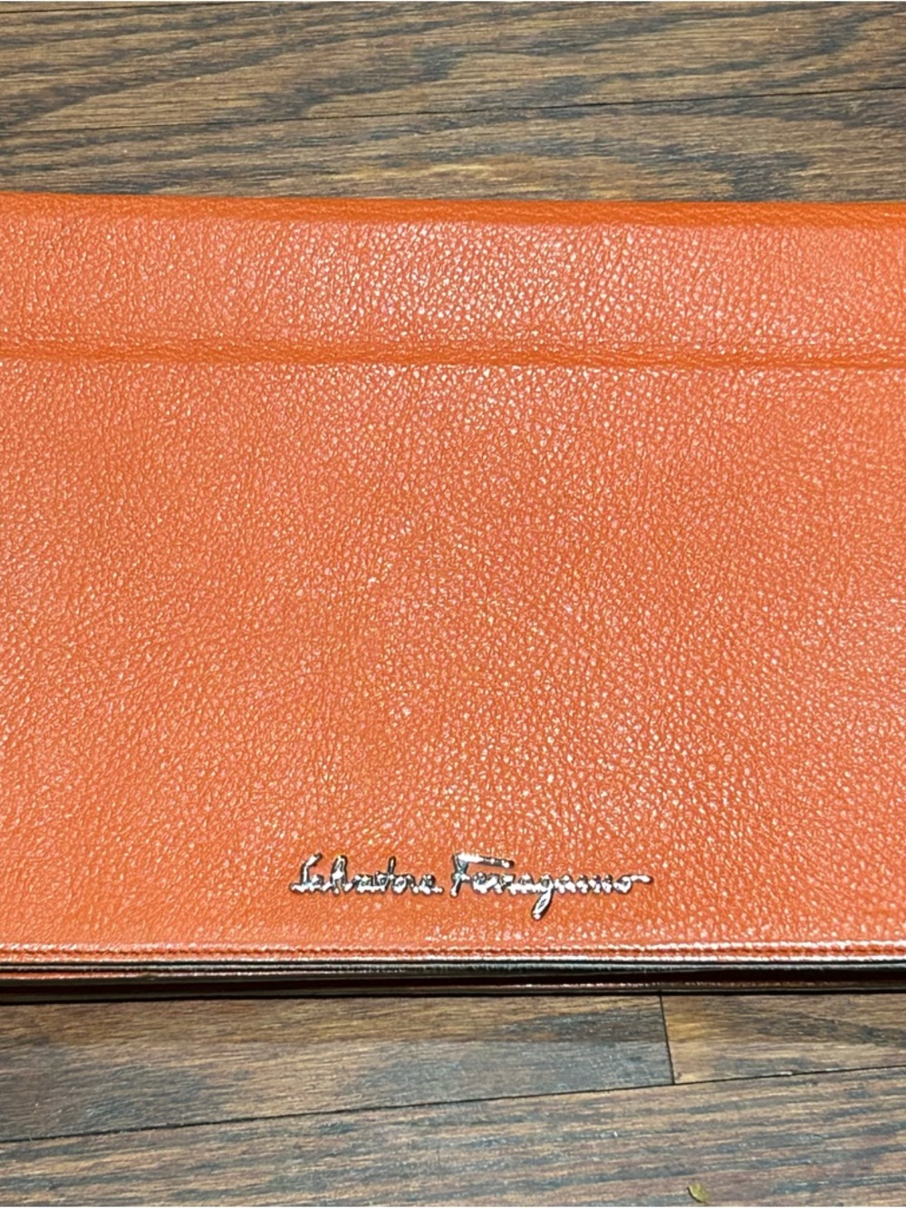 Salvatore Ferragamo Orange Leather iPad case
Serial number KD-22B420